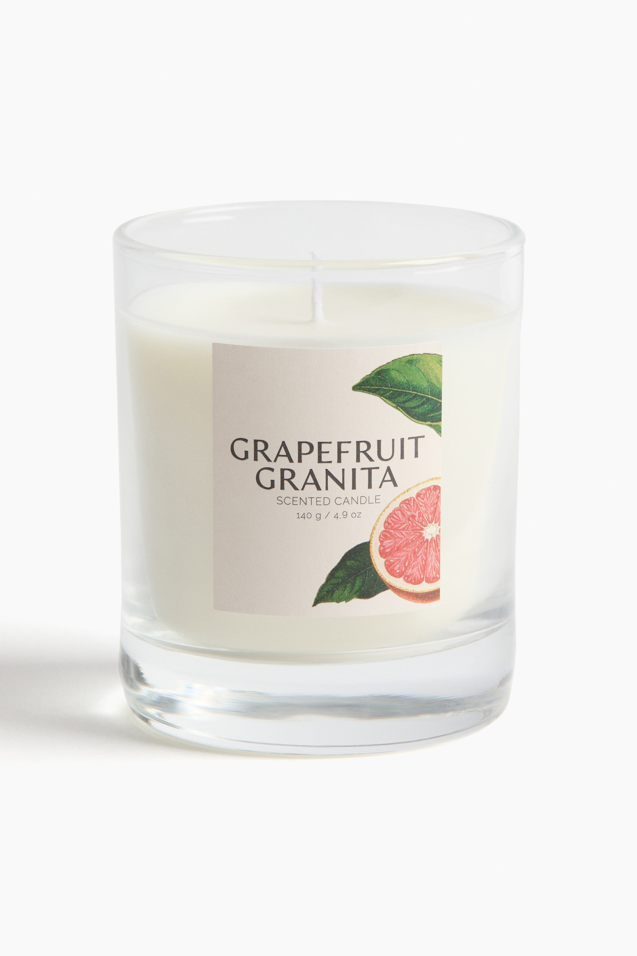 Ароматическая свеча в стеклянном контейнере H&M Запах Grapefruit Granita 8,5х7 см ракурс 2